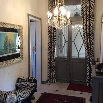 Coin salon dans l'établissement Les Lamartine-chambres d'hôtes