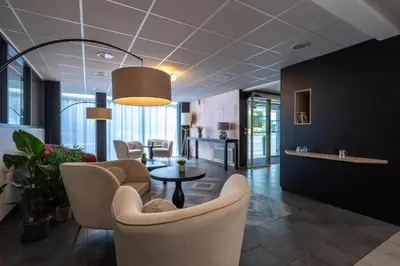 Coin salon dans l'établissement Nemea Appart Hotel Quai Victor Tours Centre