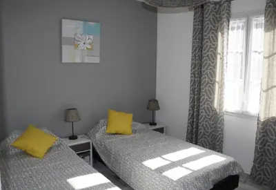 Un ou plusieurs lits dans un hébergement de l'établissement Gîte de Roches Hibou