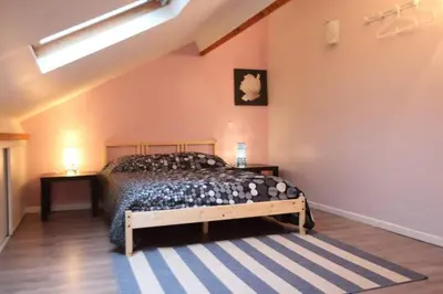 Un ou plusieurs lits dans un hébergement de l'établissement La Maison Tourangelle