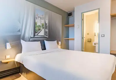 Un ou plusieurs lits dans un hébergement de l'établissement B&B HOTEL TOURS Sud Joué-lès-Tours