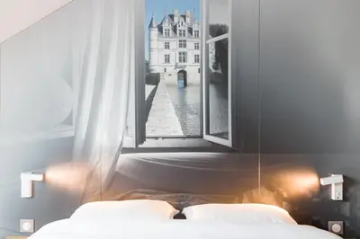 Un ou plusieurs lits dans un hébergement de l'établissement B&B HOTEL Tours Parc Expo St-Avertin