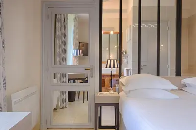 Un ou plusieurs lits dans un hébergement de l'établissement Auberge du Bon Laboureur Chenonceaux