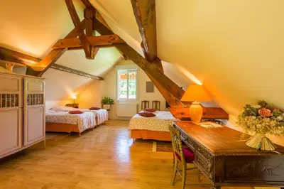 Un ou plusieurs lits dans un hébergement de l'établissement Chambres d'hôtes - Domaine Gigou