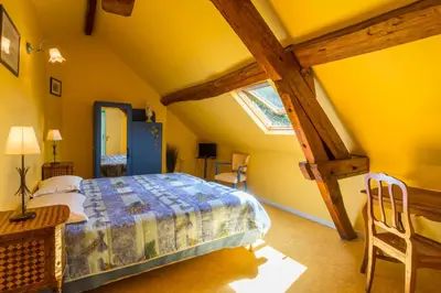 Un ou plusieurs lits dans un hébergement de l'établissement Chambres d'hôtes - Domaine Gigou