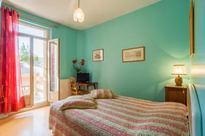 Un ou plusieurs lits dans un hébergement de l'établissement Chambres d'hôtes - Domaine Gigou