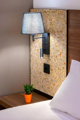 Un ou plusieurs lits dans un hébergement de l'établissement greet Hotel Chatellerault