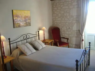 Un ou plusieurs lits dans un hébergement de l'établissement Logis Auberge de Crissay