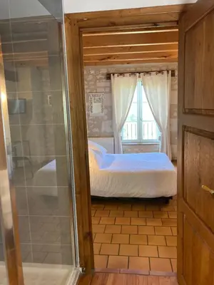 Un ou plusieurs lits dans un hébergement de l'établissement Logis Auberge de Crissay