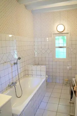 Salle de bains dans l'établissement Les Hauts de Chaume