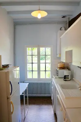 Cuisine ou kitchenette dans l'établissement Les Hauts de Chaume