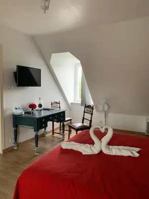 Un ou plusieurs lits dans un hébergement de l'établissement Moulin d'Amour