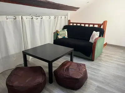 Coin salon dans l'établissement Appartement centre historique