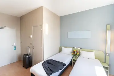 Un ou plusieurs lits dans un hébergement de l'établissement ibis budget Le Mans Centre