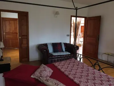Un ou plusieurs lits dans un hébergement de l'établissement CoTTAGE LA VILLA BOLERO