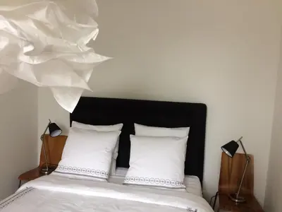 Un ou plusieurs lits dans un hébergement de l'établissement L appartement des bords du Cher