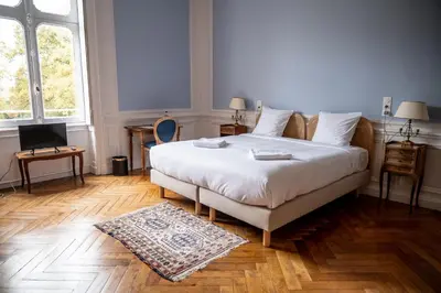 Un ou plusieurs lits dans un hébergement de l'établissement Château De L'aubrière - Teritoria