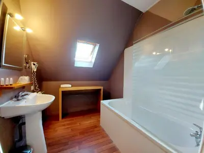 Salle de bains dans l'établissement Hotel Mondial