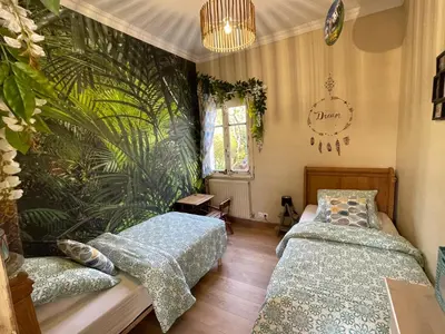 Un ou plusieurs lits dans un hébergement de l'établissement Le Clos des Trois Provinces, Zoo de Beauval