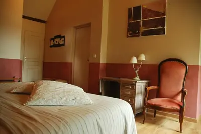 Un ou plusieurs lits dans un hébergement de l'établissement Les Pierres D'aurèle Chambres d'Hôtes