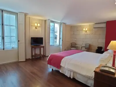 Télévision ou salle de divertissement dans l'établissement Teritoria Le Grand Monarque