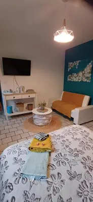 Coin salon dans l'établissement Ideal pour une pause