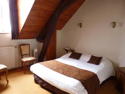 Un ou plusieurs lits dans un hébergement de l'établissement Logis Hôtels Restaurant Le Relais Chenonceaux