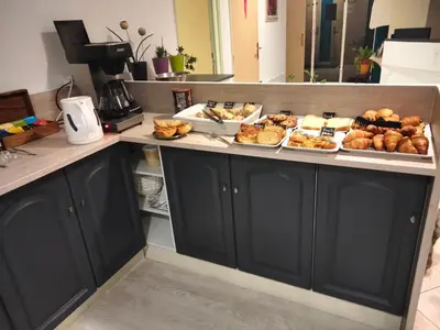 Cuisine ou kitchenette dans l'établissement Hotel Au Sans Souci