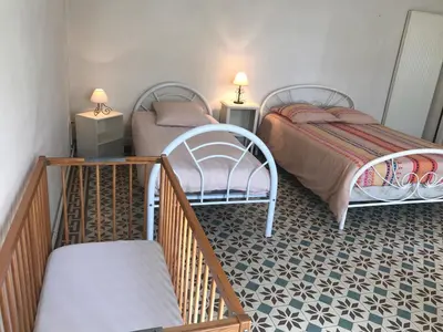 Un ou plusieurs lits dans un hébergement de l'établissement Gite Maison de campagne 86120-22 couchages