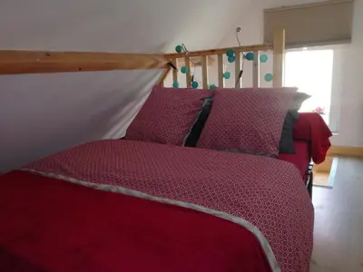 Un ou plusieurs lits dans un hébergement de l'établissement Ma Petite Maison Chambourgeoise