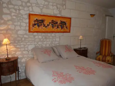 Un ou plusieurs lits dans un hébergement de l'établissement Gîte confortable à Huismes, proche de Chinon avec cour fermée - FR-1-381-370