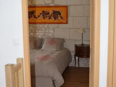 Un ou plusieurs lits dans un hébergement de l'établissement Gîte confortable à Huismes, proche de Chinon avec cour fermée - FR-1-381-370
