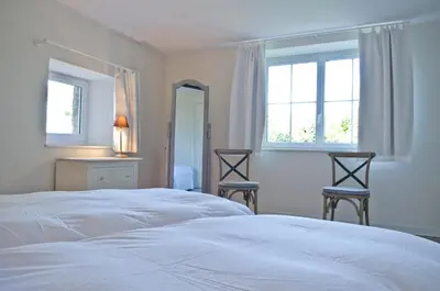 Un ou plusieurs lits dans un hébergement de l'établissement Maison Melrose
