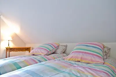 Un ou plusieurs lits dans un hébergement de l'établissement Maison Melrose