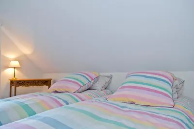 Un ou plusieurs lits dans un hébergement de l'établissement Maison Melrose