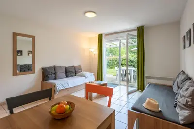 Coin salon dans l'établissement Terres de France - Le Domaine Du Golf