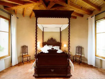 Un ou plusieurs lits dans un hébergement de l'établissement Château exceptionnel avec piscine privée, spa & WiFi - FR-1-381-410
