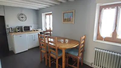 Cuisine ou kitchenette dans l'établissement La Rossignolerie - La familiale Vigneronne