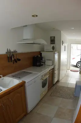 Cuisine ou kitchenette dans l'établissement le petit nid
