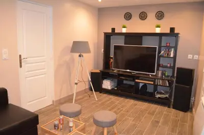 Télévision ou salle de divertissement dans l'établissement Gîte de la Merluchette