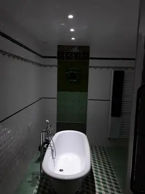 Salle de bains dans l'établissement 'La Ménagerie'
