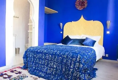 Un ou plusieurs lits dans un hébergement de l'établissement Riad SPA 