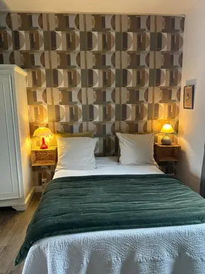Un ou plusieurs lits dans un hébergement de l'établissement Cosy Flat 2 eme étage vue château Loire à velo
