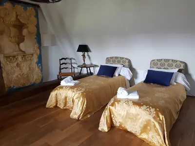 Un ou plusieurs lits dans un hébergement de l'établissement Manoir de la Beunèche - location du manoir entier
