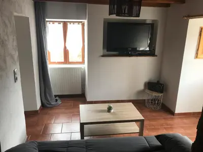 Télévision ou salle de divertissement dans l'établissement Maison de charme