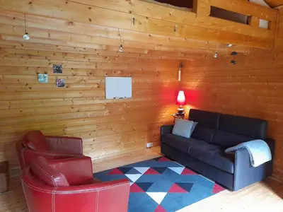 Coin salon dans l'établissement Chalet indépendant proche centre ville