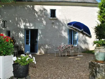Jardin de l'établissement Gîte familial confortable dans un ancien moulin avec jardin - FR-1-381-6