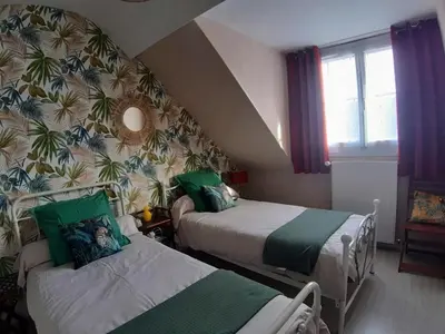 Un ou plusieurs lits dans un hébergement de l'établissement Charmante maison de campagne près de Tours avec jardin et vélos - FR-1-381-97