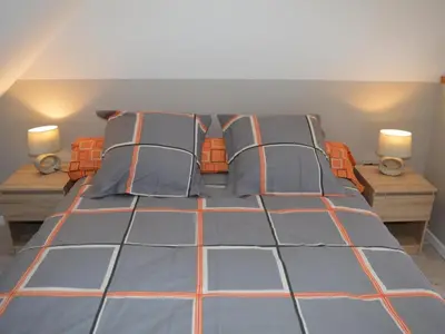 Un ou plusieurs lits dans un hébergement de l'établissement Charmant gîte à Vouvray avec 2 chambres et jardin - FR-1-381-167