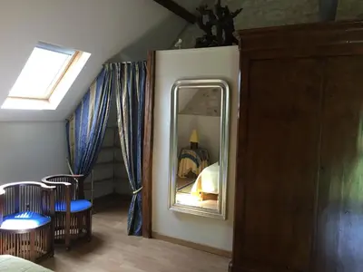 Un ou plusieurs lits dans un hébergement de l'établissement Gîte de charme dans la forêt de Chinon avec jardin clos - FR-1-381-188